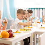 Group,Of,Children,Eating,Healthy,Food,In,Day,Care,Centre